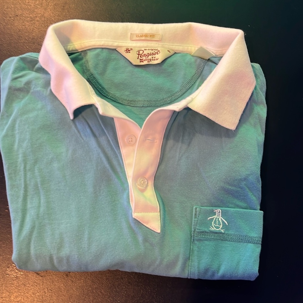 Penguin Men’s XL polo. Worn twice. Sky blue with white collar and shirt cuffs.